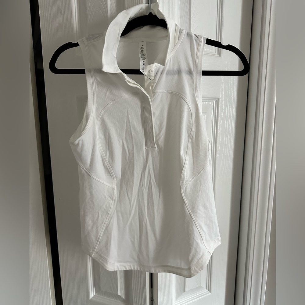 Never worn lululemon quick dry sleeveless polo shirt, size 4